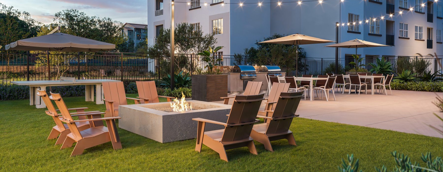 a fire pit with chairs