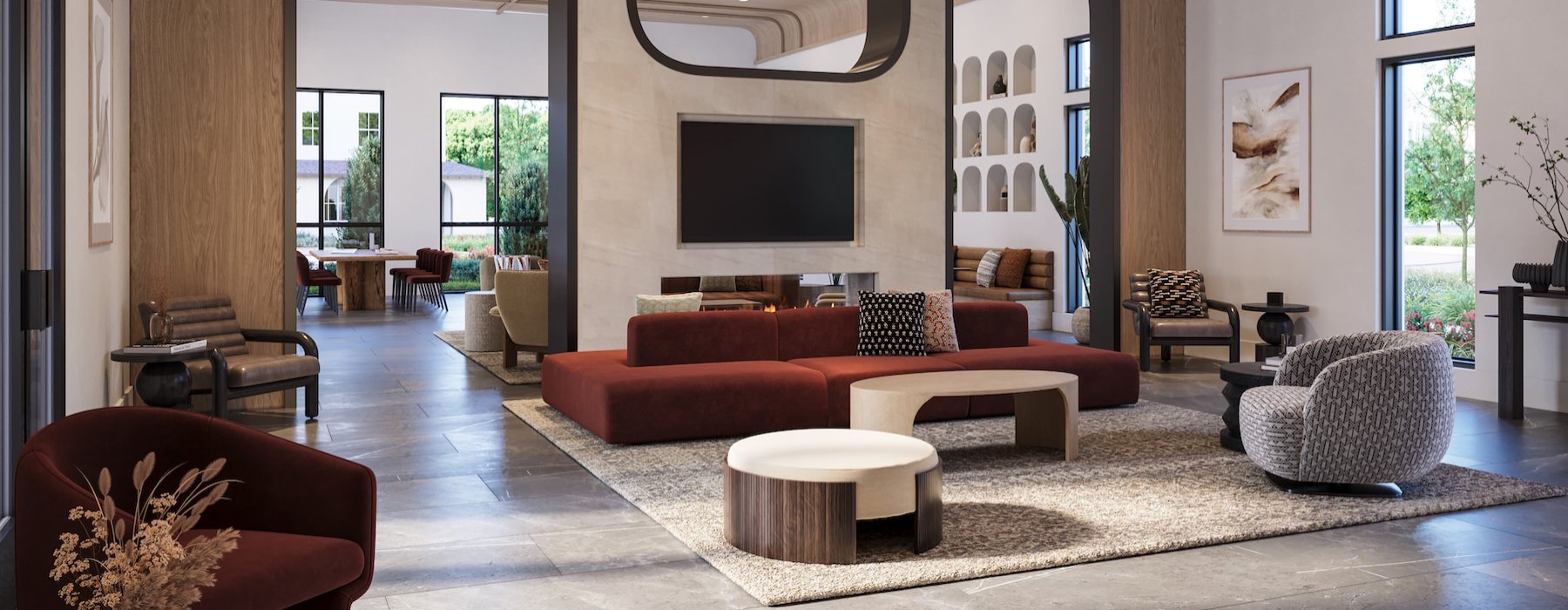 a clubroom with chairs, a couch and a tv