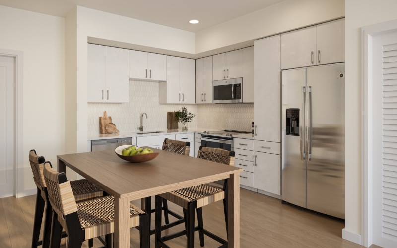 a kitchen with white cabinets