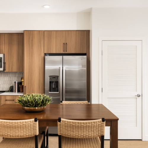 Kitchen with wood cabinets in homes for rent in Murrieta, CA at Montessa Heights.